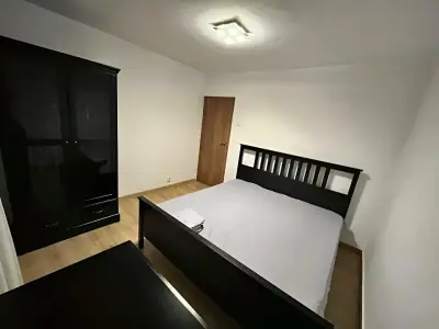 Apartament de inchiriere in Sector 1 Bucuresti dormitor utilat